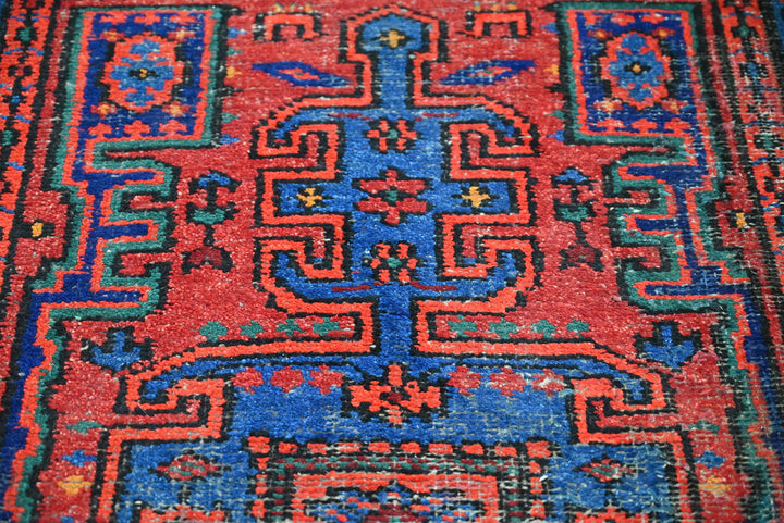 red Accent rug 2' 11" x 4' 4"