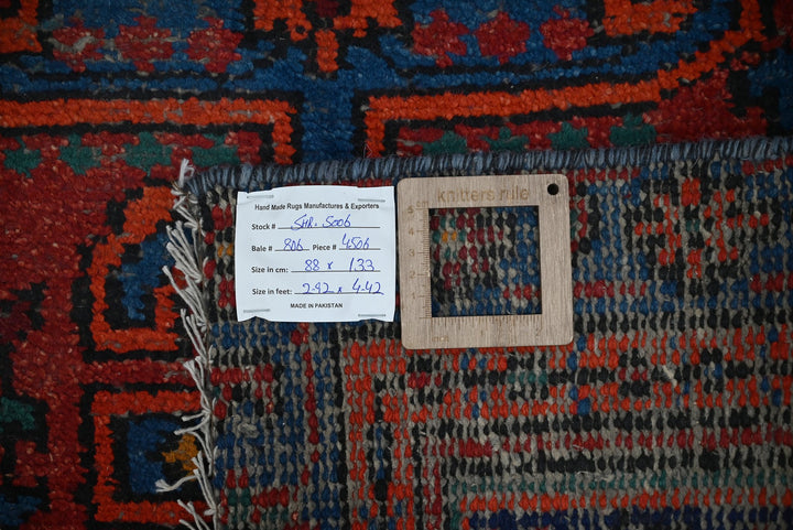 red Accent rug 2' 11" x 4' 4"