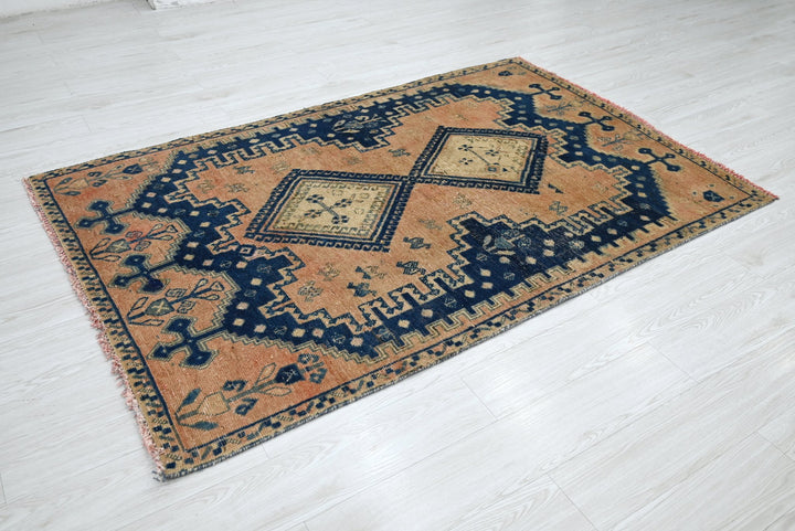 orange Accent rug 4' 2" x 6' 5"