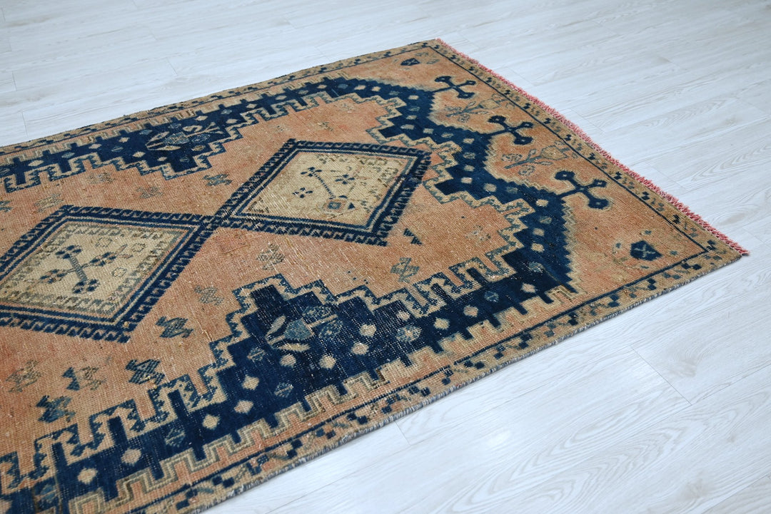 orange Accent rug 4' 2" x 6' 5"