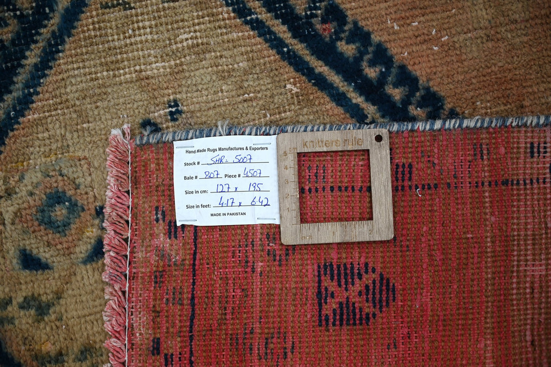 orange Accent rug 4' 2" x 6' 5"