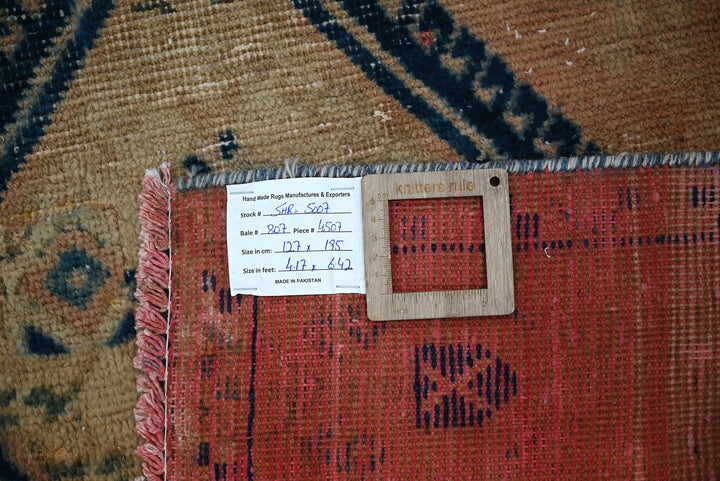 orange Accent rug 4' 2" x 6' 5"