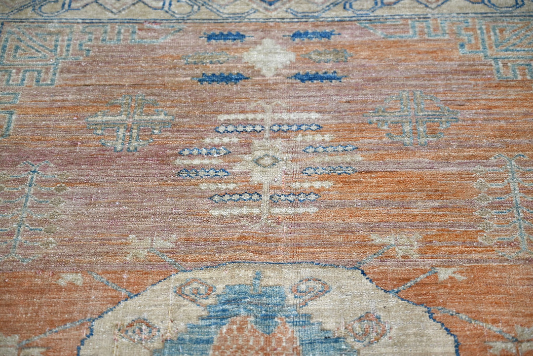orange Medium rug 5' 2" x 6' 5"