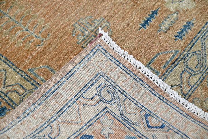 orange Medium rug 5' 2" x 6' 5"