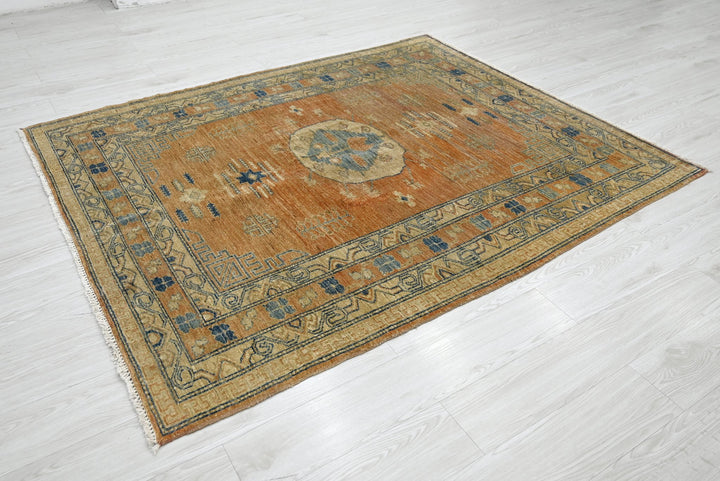orange Medium rug 5' 2" x 6' 5"