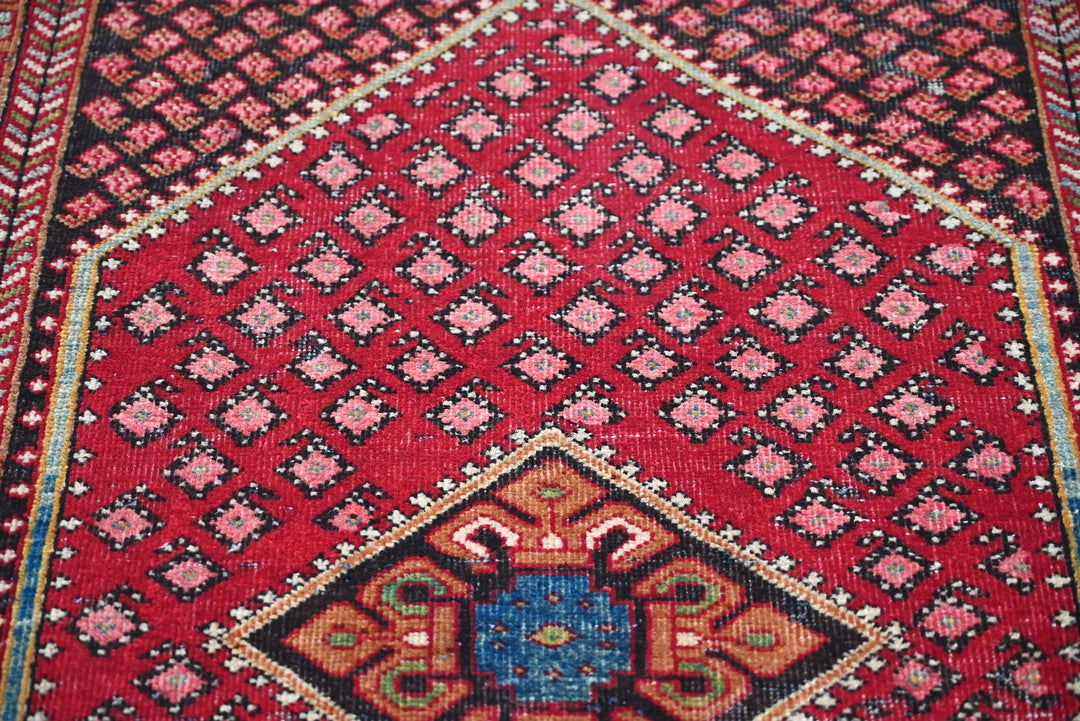 red Accent rug 2' 10" x 4' 4"