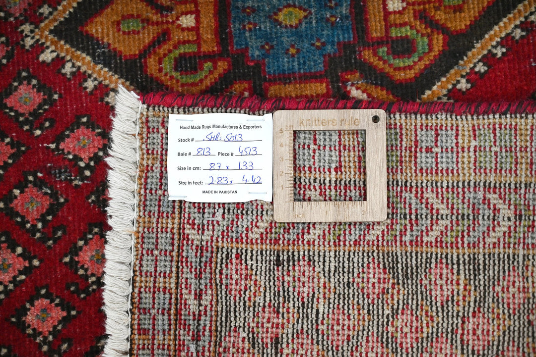 red Accent rug 2' 10" x 4' 4"