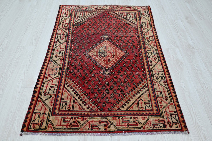 red Accent rug 3' 2" x 4' 11"