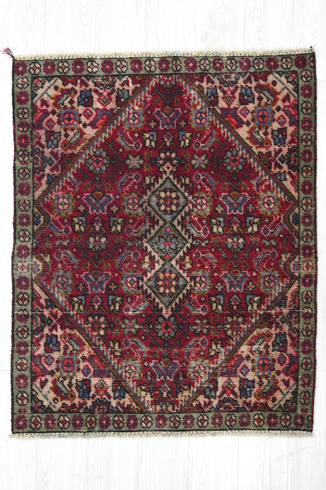 red Accent rug 3' 0" x 3' 11"
