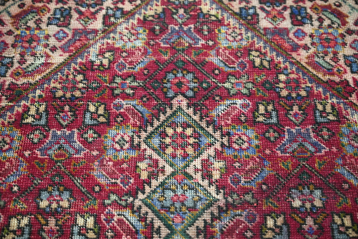 red Accent rug 3' 0" x 3' 11"
