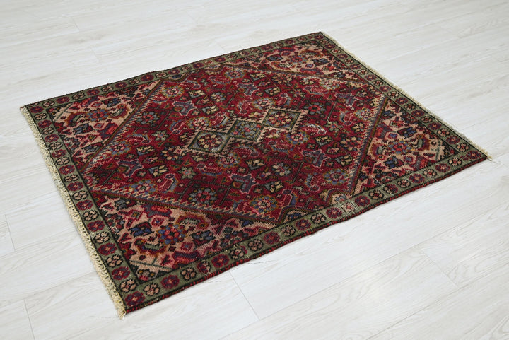 red Accent rug 3' 0" x 3' 11"