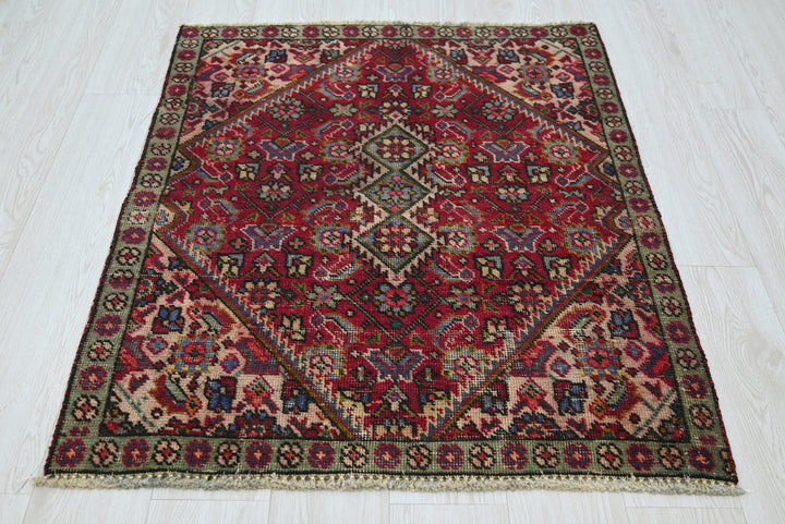 red Accent rug 3' 0" x 3' 11"