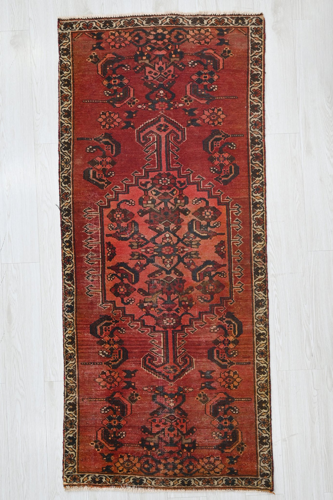 red Accent rug 2' 8" x 6' 0"
