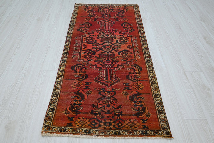 red Accent rug 2' 8" x 6' 0"