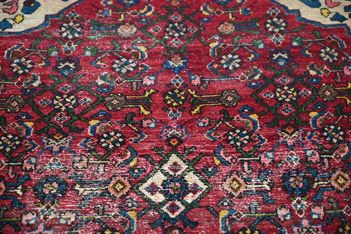 red Accent rug 2' 9" x 4' 1"