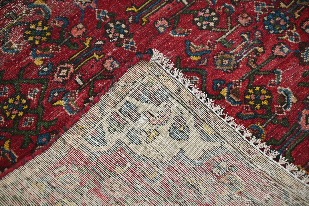 red Accent rug 2' 9" x 4' 1"