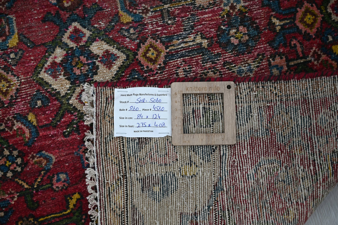 red Accent rug 2' 9" x 4' 1"