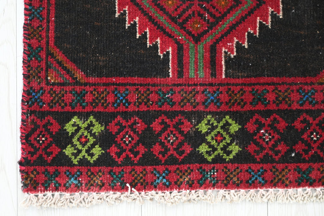 black Runner rug 1' 5" x 6' 2"
