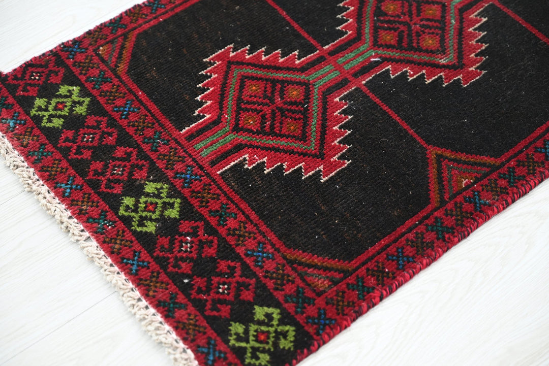black Runner rug 1' 5" x 6' 2"