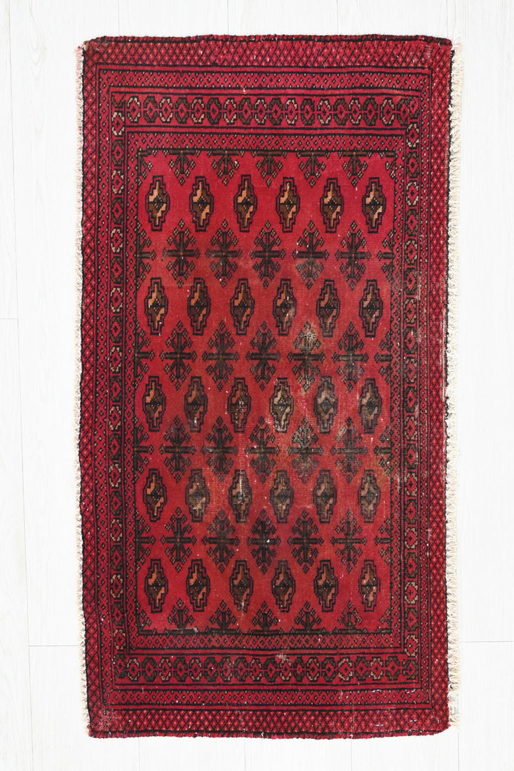 red Accent rug 1' 8" x 3' 1"