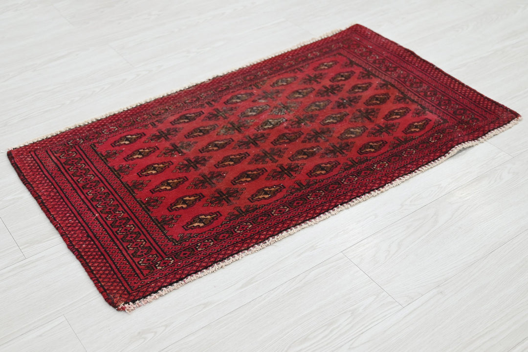red Accent rug 1' 8" x 3' 1"