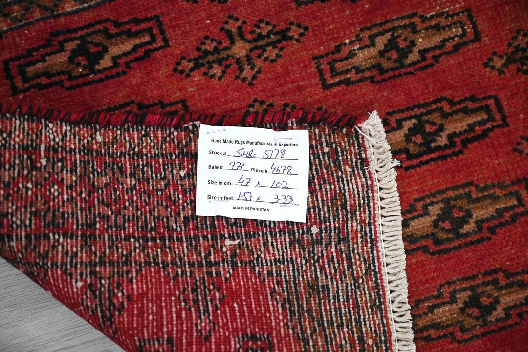 red Accent rug 1' 7" x 3' 4"