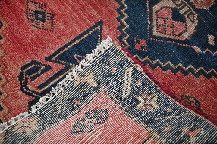red Accent rug 2' 5" x 3' 6"