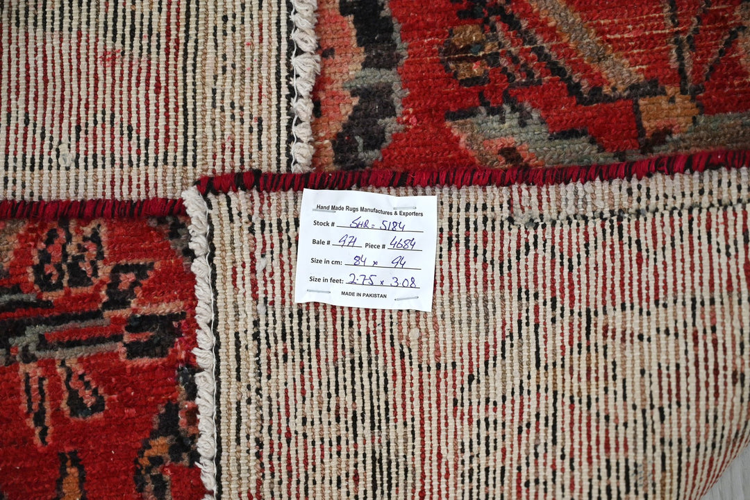 red Accent rug 2' 9" x 3' 1"
