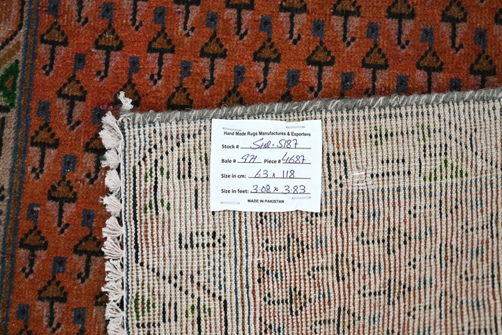 orange Accent rug 2' 1" x 3' 10"