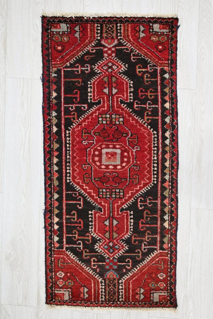 red Accent rug 1' 9" x 3' 9"