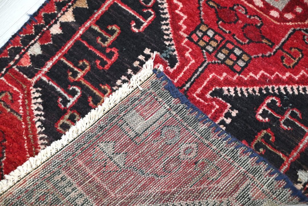 red Accent rug 1' 9" x 3' 9"