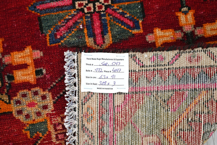 red Accent rug 2' 1" x 3' 0"
