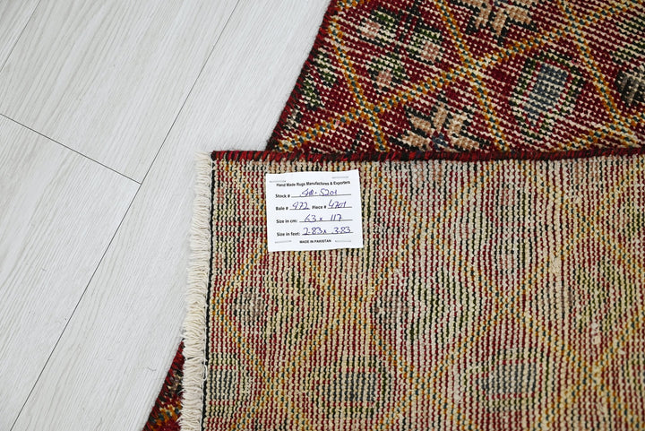 red Accent rug 2' 1" x 3' 10"