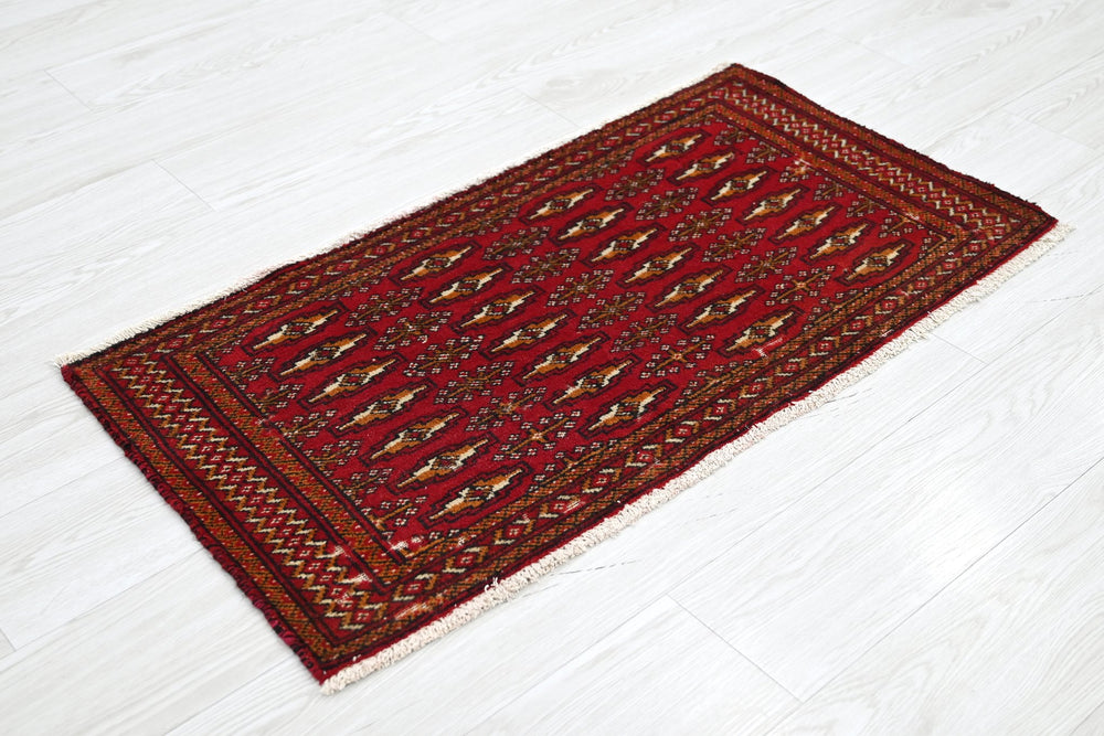 red Accent rug 1' 8" x 3' 3"