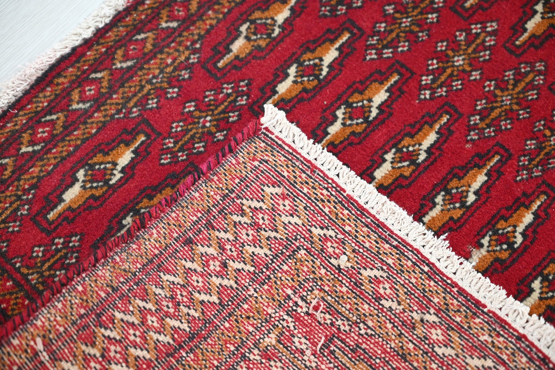 red Accent rug 1' 8" x 3' 3"