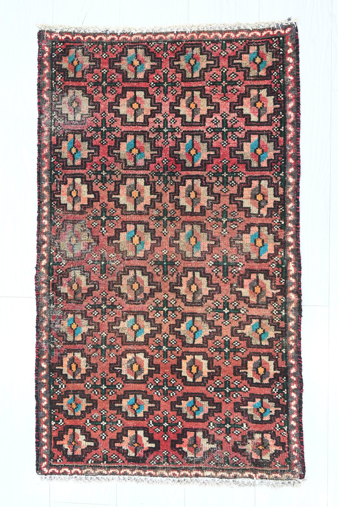 red Accent rug 1' 10" x 3' 2"