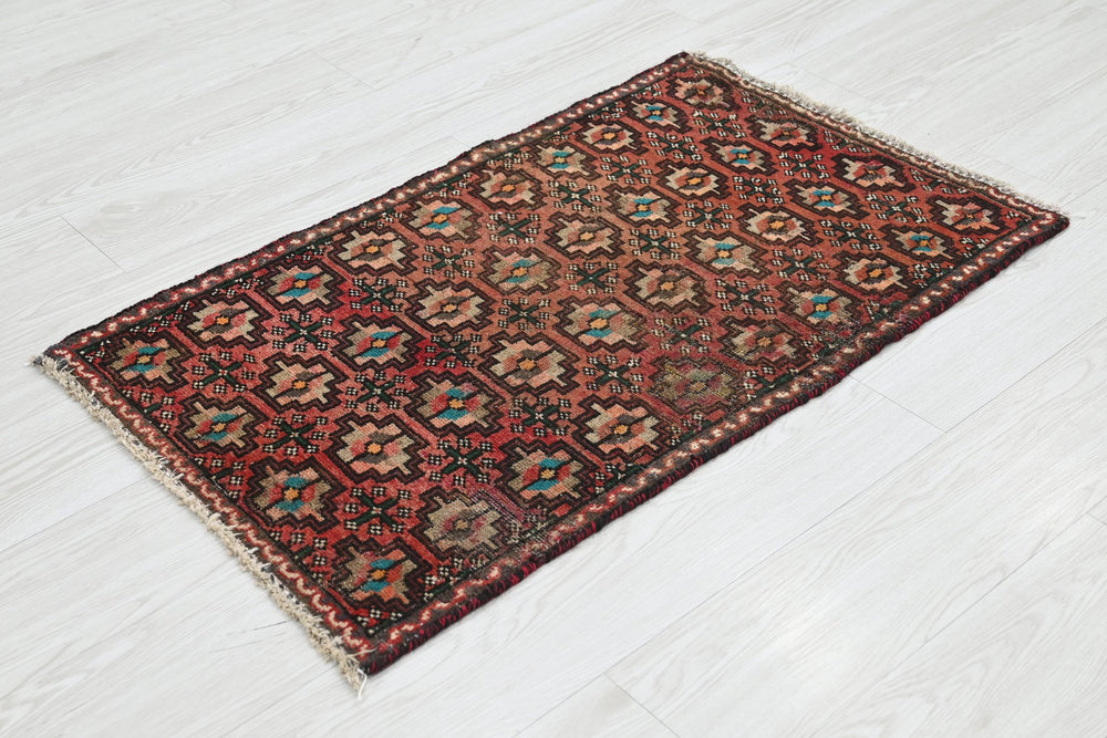 red Accent rug 1' 10" x 3' 2"