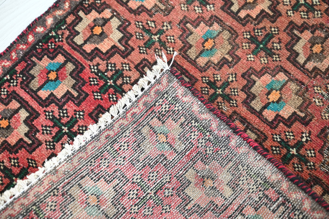 red Accent rug 1' 10" x 3' 2"