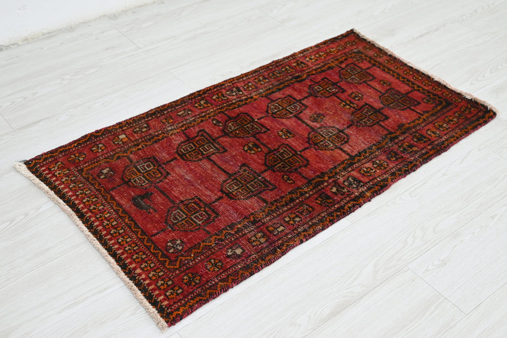 red Accent rug 1' 11" x 3' 5"