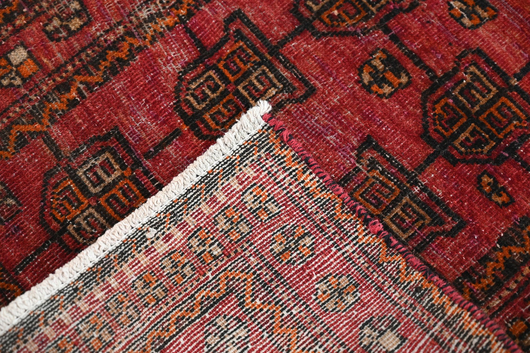 red Accent rug 1' 11" x 3' 5"