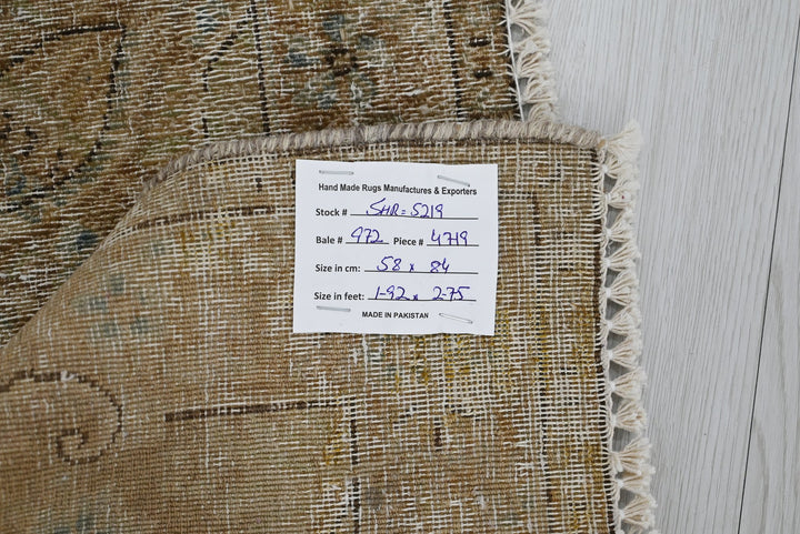 brown Accent rug 1' 11" x 2' 9"