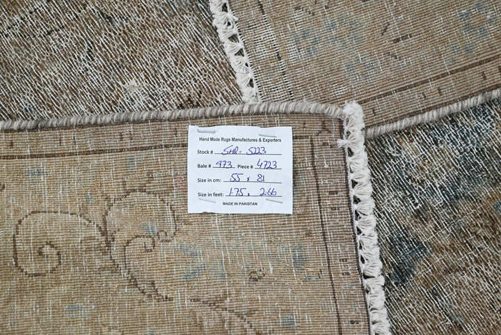 brown Accent rug 1' 10" x 2' 8"
