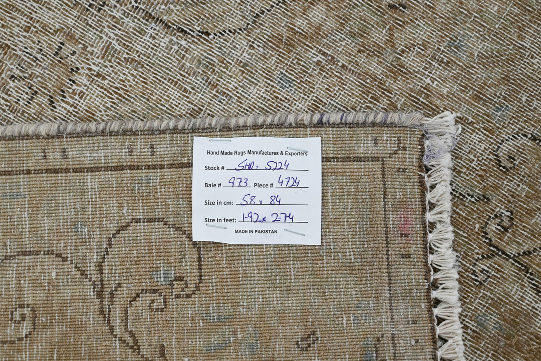 brown Accent rug 1' 11" x 2' 9"
