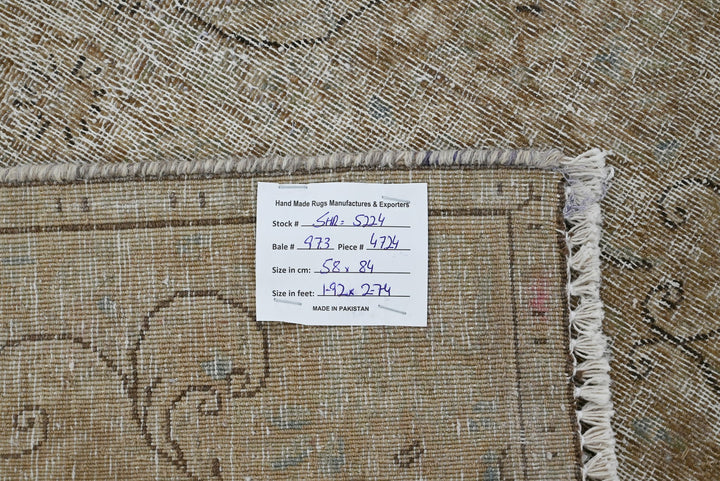 brown Accent rug 1' 11" x 2' 9"