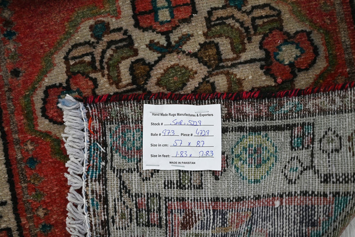 red Accent rug 1' 10" x 2' 10"
