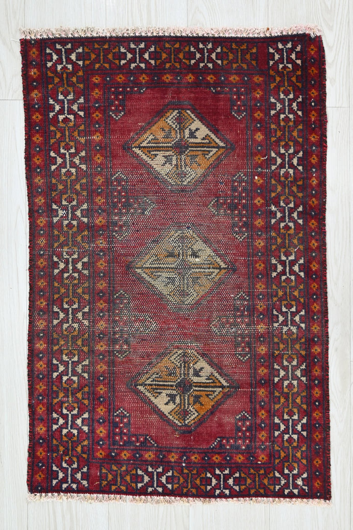red Accent rug 1' 10" x 2' 8"