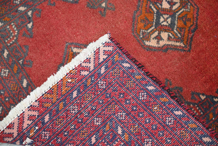 red Accent rug 1' 10" x 2' 8"