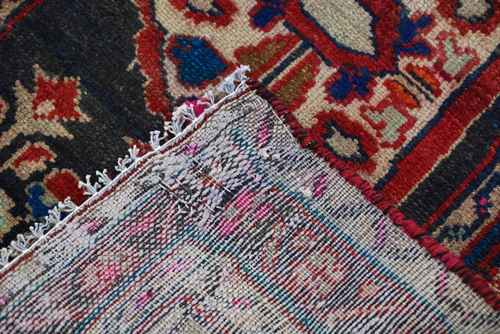 black Accent rug 1' 11" x 2' 10"