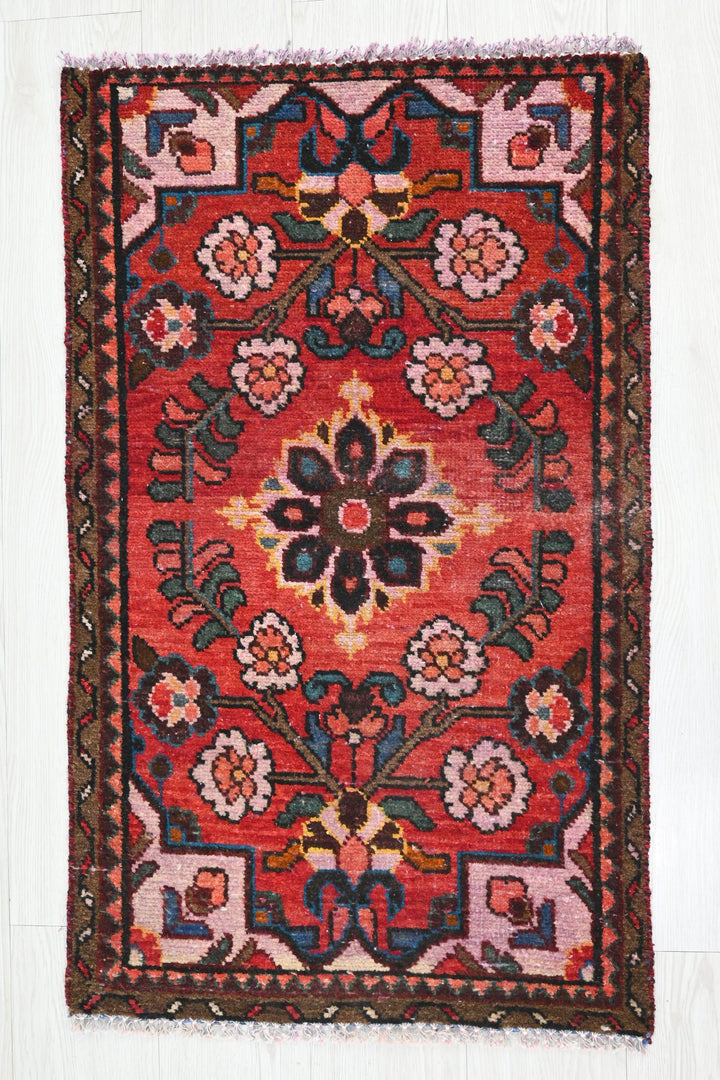 red Accent rug 1' 10" x 3' 1"
