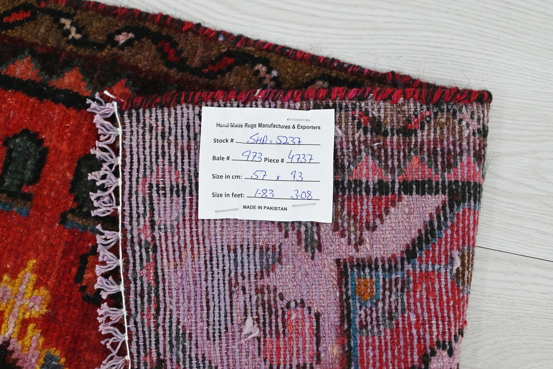 red Accent rug 1' 10" x 3' 1"